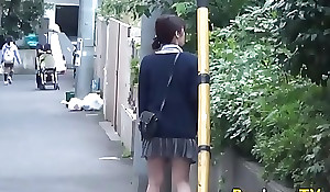 Oriental babe pees publicly